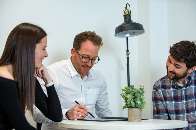 three colleagues working